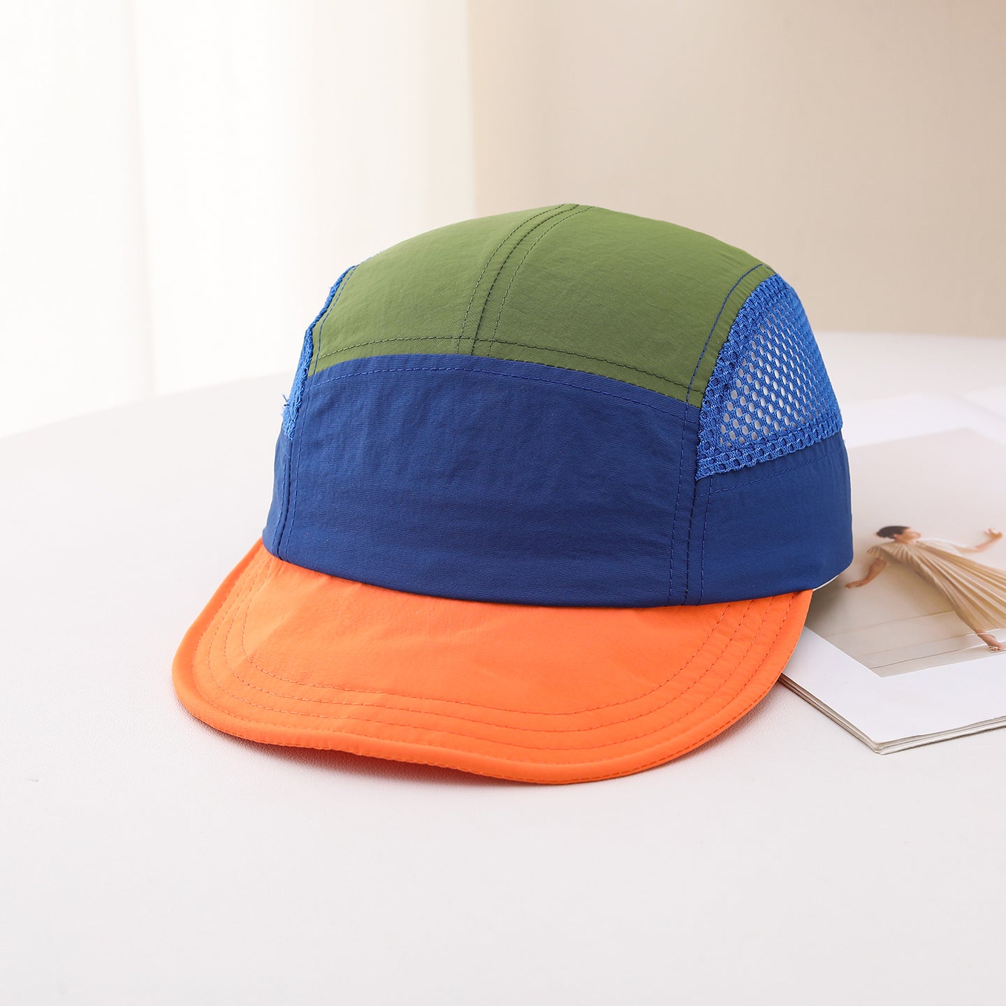 Multi-color Stitched Mesh Fabric, Lightweight And Breathable, Simple And Casual Style. This Baseball Cap With A Flat Brim Is Suitable For Sports, Travel And Daily Use.