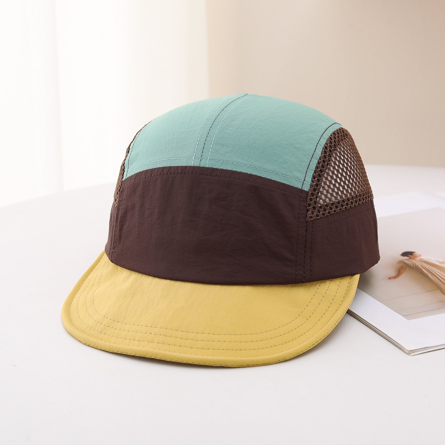 Multi-color Stitched Mesh Fabric, Lightweight And Breathable, Simple And Casual Style. This Baseball Cap With A Flat Brim Is Suitable For Sports, Travel And Daily Use.